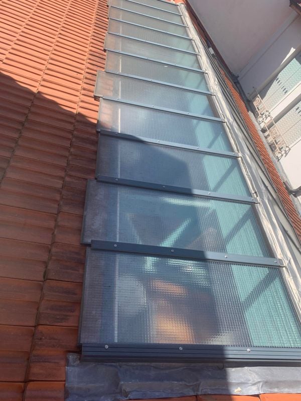 Pose de gouttières zinc et PVC à Argenteuil